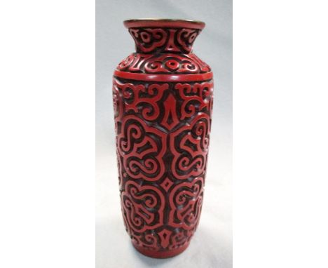 A 20th century guri lacquer vase, the flared neck with ruyi band above rosettes on the rounded cylindrical body enclosed by i