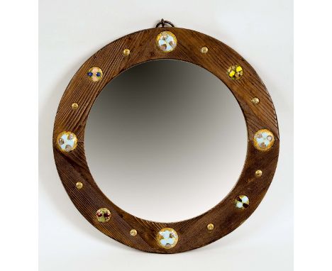 ARTS & CRAFTS WOODEN & ENAMEL MIRROR an interesting pine mirror, inset with enamel roundels of differing sizes. With a metal 