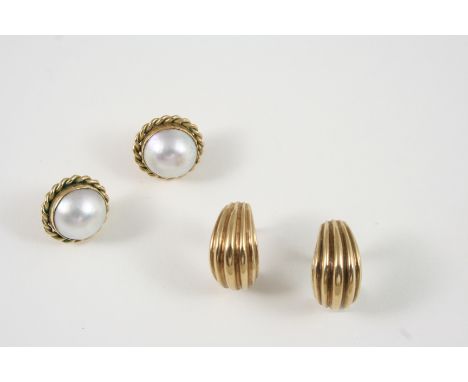 A PAIR OF MABE PEARL AND 9CT. GOLD STUD EARRINGS each set with a mabe pearl within a gold surround, 1.75cm. dia., together wi