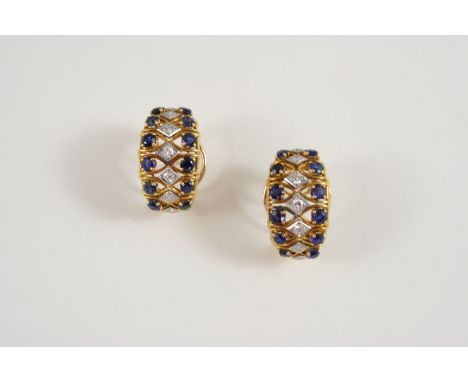 A PAIR OF SAPPHIRE AND DIAMOND EARRINGS each earring centred with a line of single-cut diamonds flanked by two rows of circul