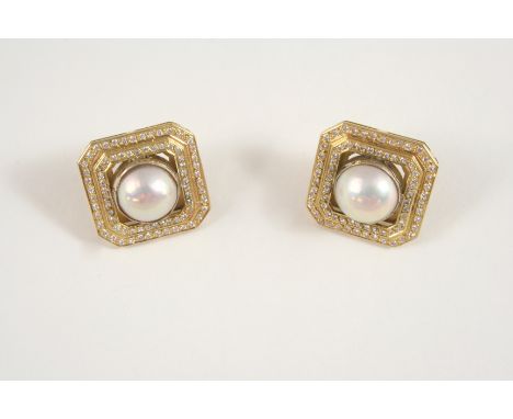 A PAIR OF DIAMOND AND CULTURED PEARL EARRINGS each earring is centred with a half pearl within a double surround of circular-