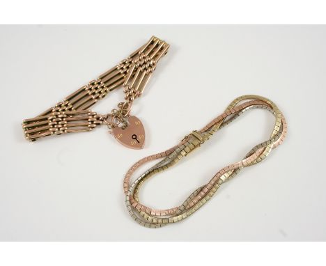 A 9CT. GOLD GATE LINK BRACELET with padlock clasp, 14.3 grams, together with a 9ct. three colour gold bracelet, 15.8 grams. 