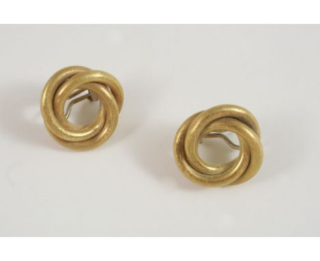A PAIR OF GOLD EARRINGS of textured swirl design, 2.5cm. wide, 18.8 grams, with post fittings. 