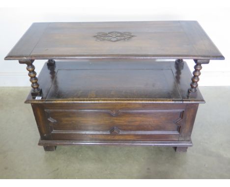 An oak monks bench with lift up seat - Width 100cm x Depth 46cm