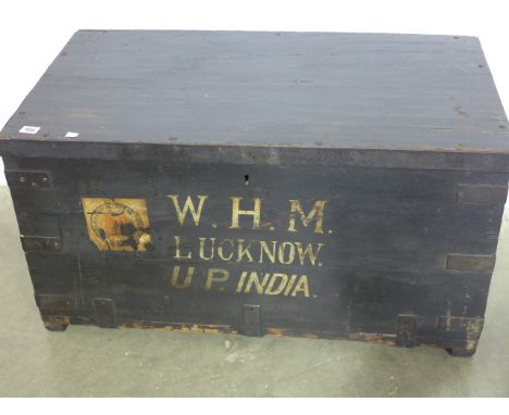 A 19th century travel trunk with old labels - W. H. Murray U.P. India - in original finish - metal bound with recessed carryi