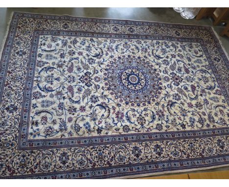 A beige ground handmade very fine part silk Persian Nain carpet - 3.50m x 2.50m 