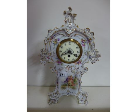An ornate china mantle clock - Height 34cm - no key, chip to side