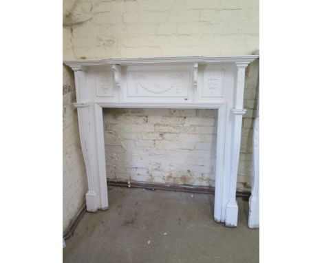A white painted pine Adams style fire surround - Height 132cm x Width 142cm - internal 95cm x 95cm 