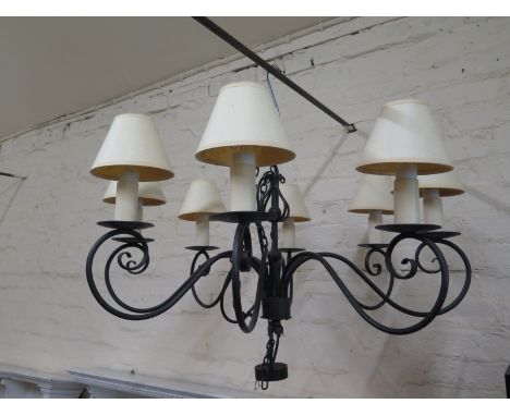 A black wrought iron metal 8 branch chandelier - Diameter 82cm