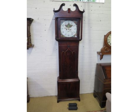 A Georgian mahogany eight day longcase clock with a painted 14" dial with moon roller and calendar dials striking on a bell, 