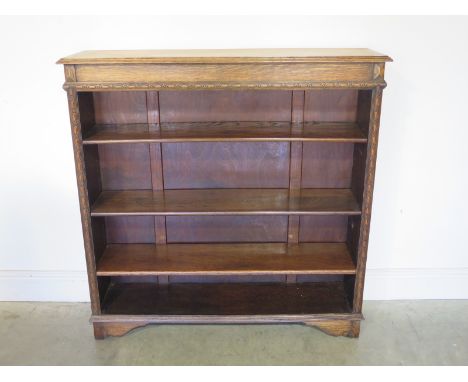 A large Victorian oak three shelf adjustable bookcase - Height 108cm x 107cm x 28cm