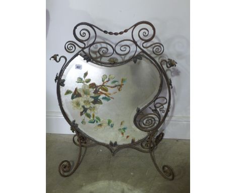 An early 1900's decorative wrought iron mirrored fire screen - Height 77cm x 59cm