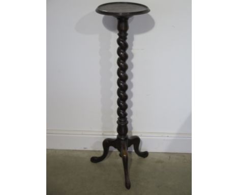 An oak barleytwist jardiniere stand on a tripod base - Height 105cm