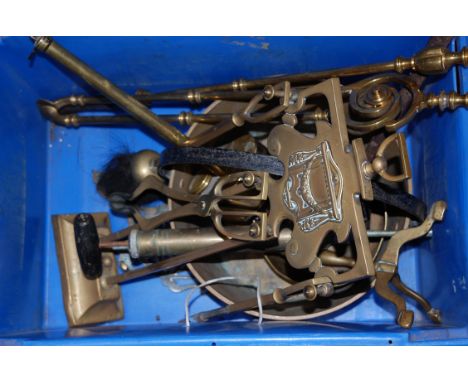 A box of miscellaneous metalwares to include turned brass fire tools, brass roasting jack, etc