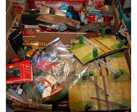 Two boxes of miscellaneous children's toys to include clockwork tinplate tank, Triang tractor, Hornby turntable etc