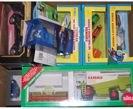 Three various Ertl Thomas the Tank Engine boxed vehicles, to include Bertie, Harold and Thomas, Terence, James and Percy, Tob
