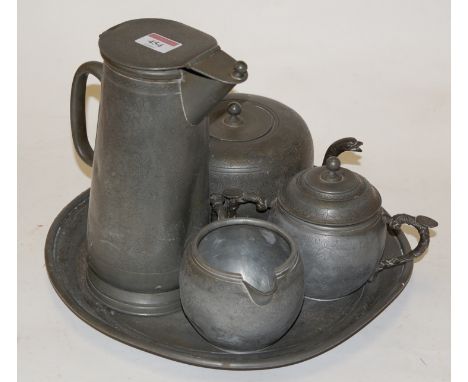 A late 19th century Chinese pewter four piece tea / coffee service on tray, with all-over foliate engraved decoration, by Kut