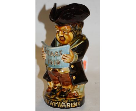An Ault pottery Toby jug to commemorate the end of the Great War impressed Ault England verso