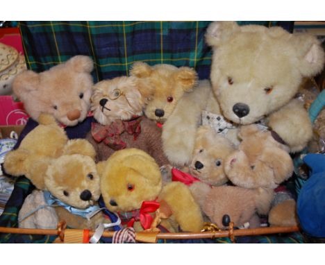 A modern Steiff mohair collector's bear, with ribbon and button to ear, together with various other collectors' bears, bisque