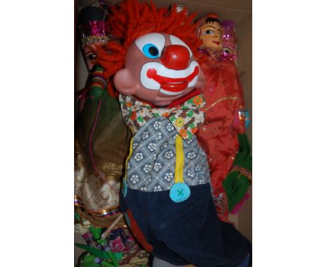 Five various eastern hand puppets together with one other clown puppet