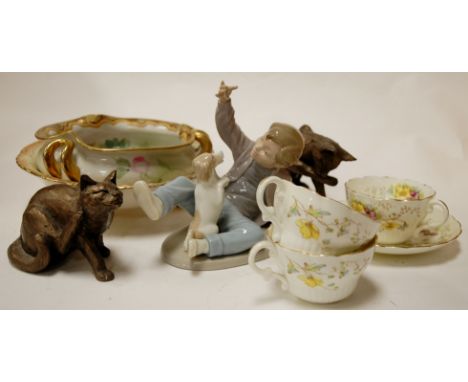 A box of miscellaneous items to include Nao figure of a boy with dog, a Noritake bowl, and Victorian part tea service etc