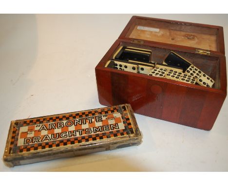 A Chad Valley Arbonite draughtsman's set, boxed; together with a boxed set of dominoes