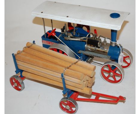 A Wilesco German live steam traction engine in blue, with trailer 