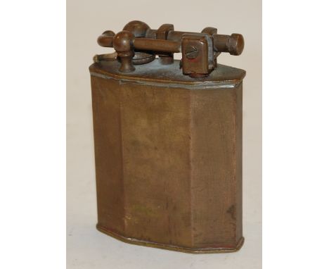 An early 20th century French Rustic brass table lighter  Condition Report / Extra Information Top arm loose and with solder r