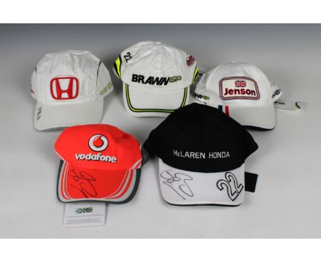 Jenson Button F1 Grand Prix team hats - Honda Racing / Brawn / McLaren Honda / McLaren Mercedes, both McLaren hats sighed by 