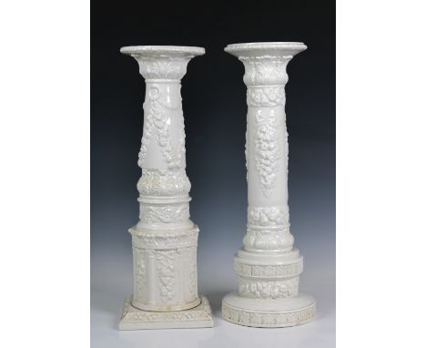 Two Continental, 20th century, white ceramic circular pedestals with floral decoration, one with a square base, the other a c