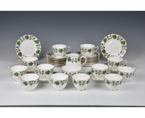 A Crown Staffordshire part tea service, for twelve place settings, in the Green Vine pattern, printed factory marks, comprisi