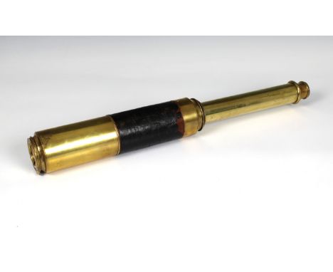 A 19th century four-draw brass telescope, engraved 'Dolland, London Day &amp; Night', having leather partial cover, 12in. (30