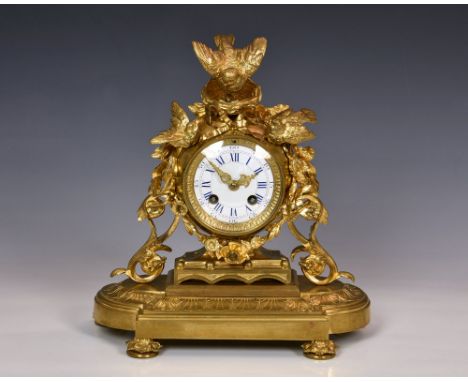 A 19th century ormolu mantel clock in the manner of Jules Moigniez, the twin train movement with outside countwheel strike on