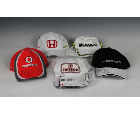 Jenson Button F1 Grand Prix team hats - Honda Racing / Brawn / McLaren Honda / McLaren Mercedes, both McLaren hats sighed by 