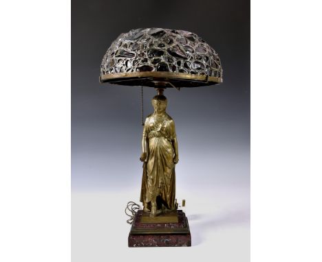 After Francois Mage (French, d.1910 A Tiffany style classical maiden bronze table lamp, raised on stepped marble base, having