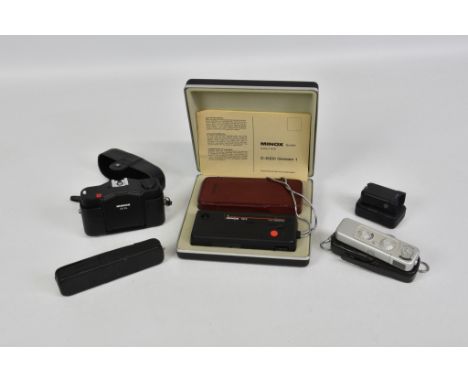 Minox Sub Miniature Cameras, to include Minox 110 S, cased with paperwork; Minox B chrome with case; Minox C Black with case;