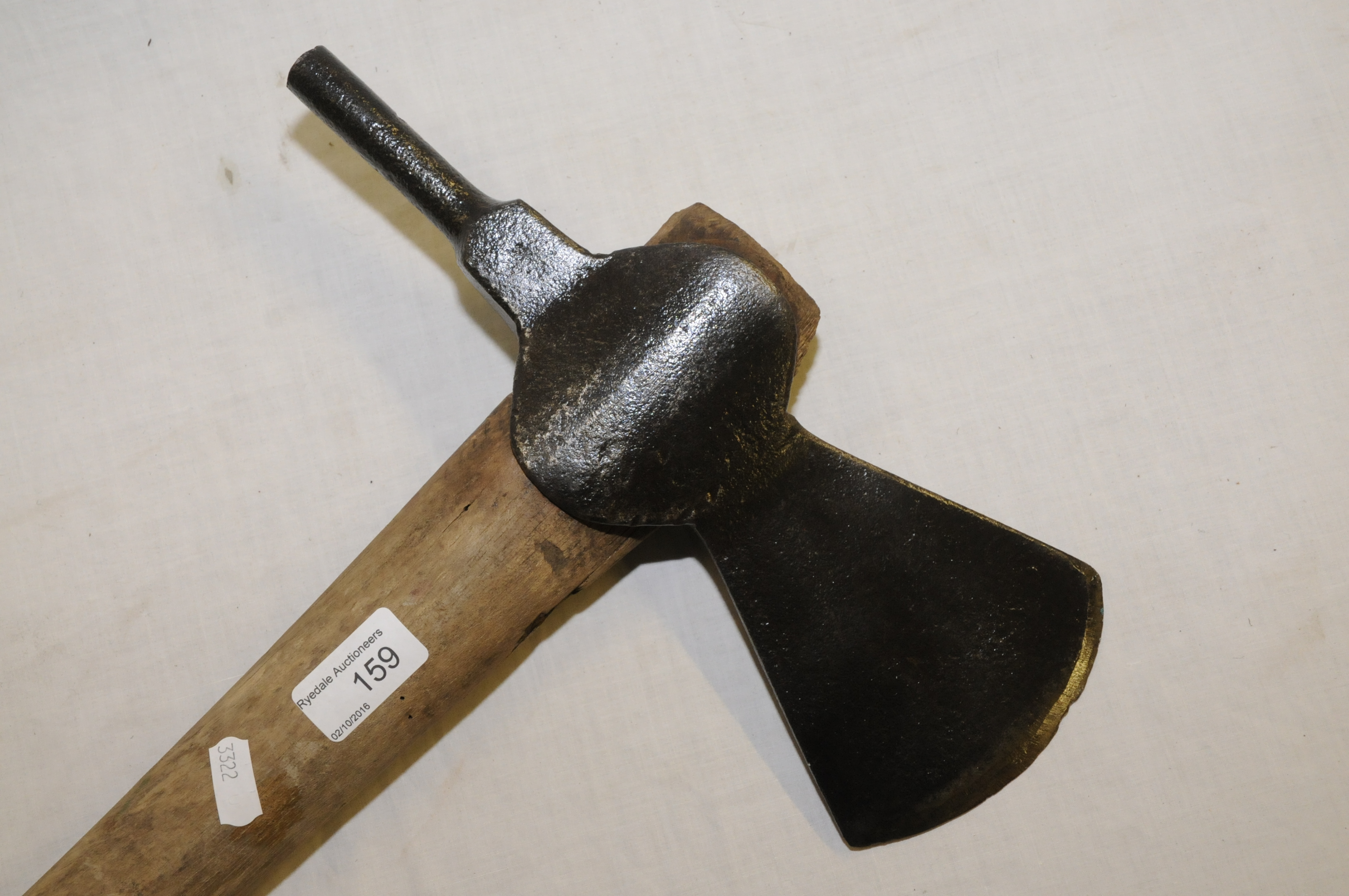 Unusual Butchers pole axe, the wooden shaft with axe head with traces of makers mark, the reverse
