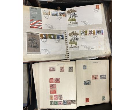 Assorted world stamps, in four albums and assorted cigarette cards (box)