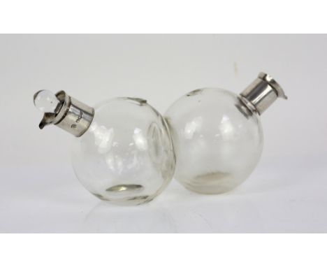 George V silver-mounted oil and vinegar, by William Hutton and Sons, Sheffield 1912, with double-bowled glass body and glass 