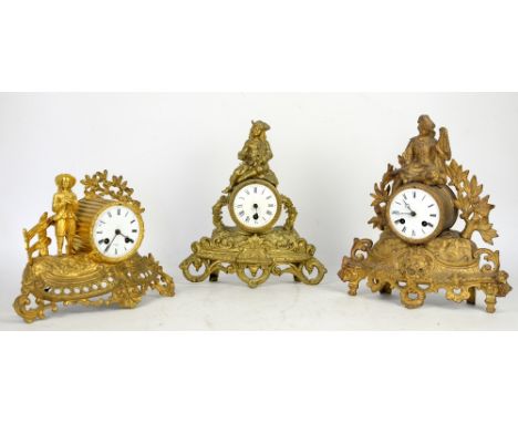 Three French gilt spelter mantle clocks, to include a 19th century gilt spelter mantle clock with young gentleman to top flan