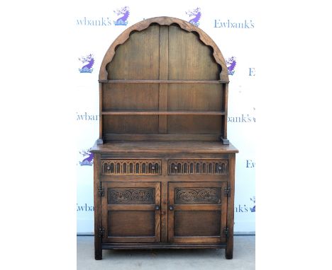 18th century style oak dresser base, with two short over two cupboard doors, with associated oak shelf, H87 x W111 x D47cm (c