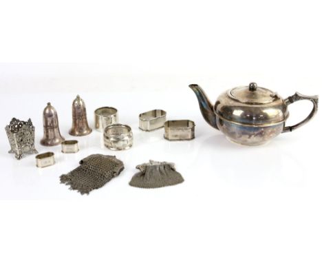 Selection of silver and plate to include a plated squat teapot, napkin rings, purses, flatware, etc        