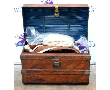 Metal domed top trunk, with a collection of ladies clothes         
