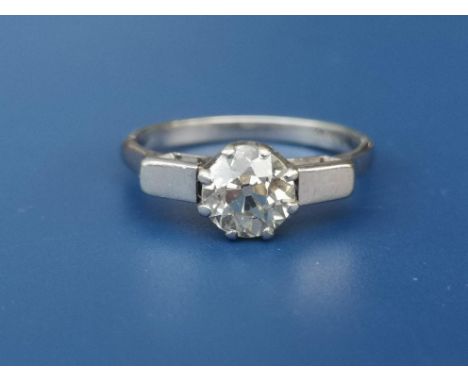 An art deco old cut diamond solitaire ring, the claw set stone weighing approximately 0.90 carat on platinum shank.  Finger s