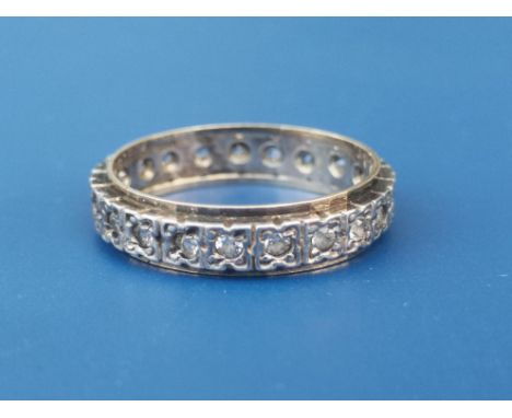 A diamond eternity ring.  Finger size N/O.