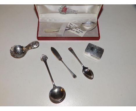 A small Birmingham silver snuff box, a Sheffield silver caddy spoon - DNH&amp;S and three other spoons. (5)