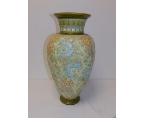 A Burmantofts 'Faience' vase, the tube-lined decoration depicting pale blue flowers with leafy stems - 2063, 18" high - verti