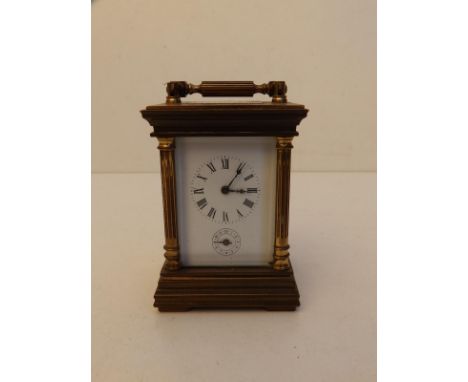 A small 20thC French brass cased alarum carriage clock,  3.2" high excluding dial.