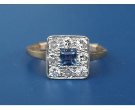 A sapphire &amp; diamond pave set square cluster ring.  Finger size approximately N.