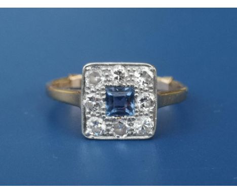 A sapphire &amp; diamond pave set square cluster ring.  Finger size approximately N.